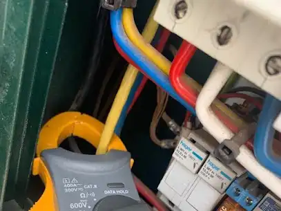 Electrician at work in Plumstead